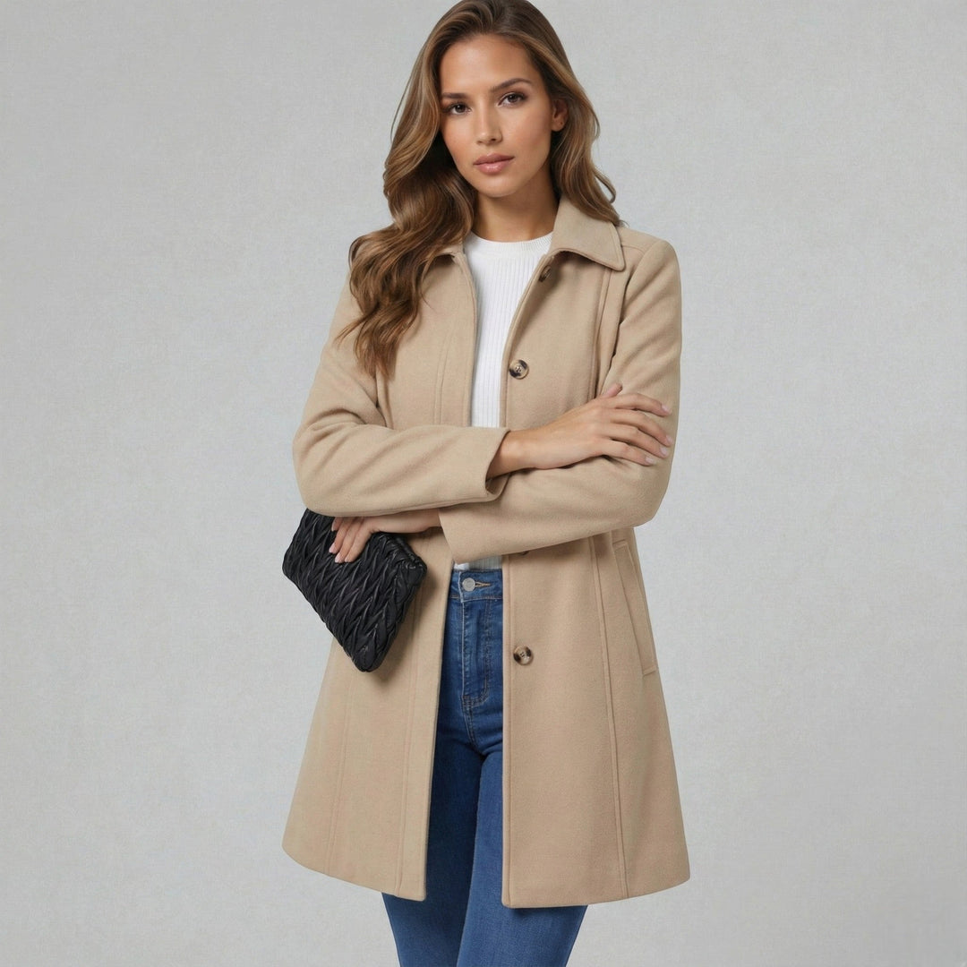Elegant A-line women's coat with button closure. A chic, timeless piece for fall & winter fashion.