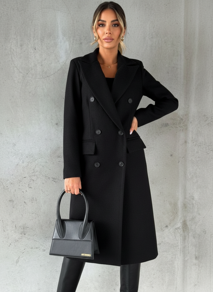 Classic women's long double-breasted coat, ideal for professional wear & sophisticated autumn fashion.