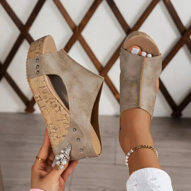 Adjustable women's walking sandals, open-toe wedge style with orthopedic arch-stabilizing comfort.