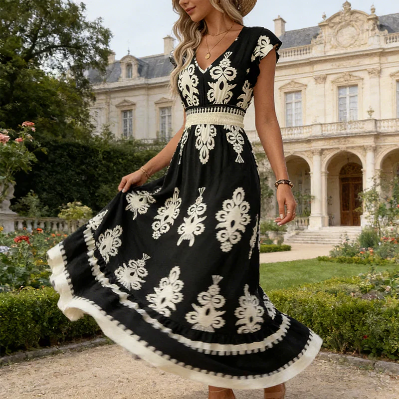 Chic women's V-neck A-line midi dress with an elegant graphic print, perfect for any occasion.