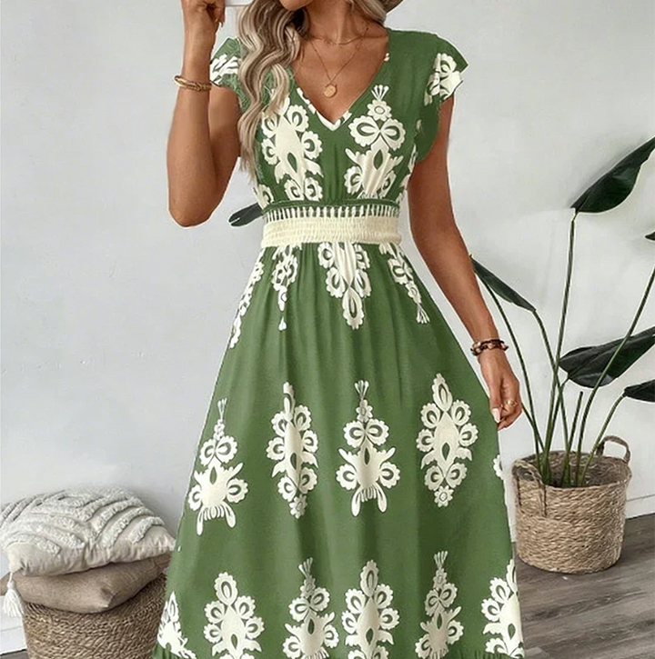 Women's elegant A-line midi dress, featuring a striking graphic print for day-to-night wear.