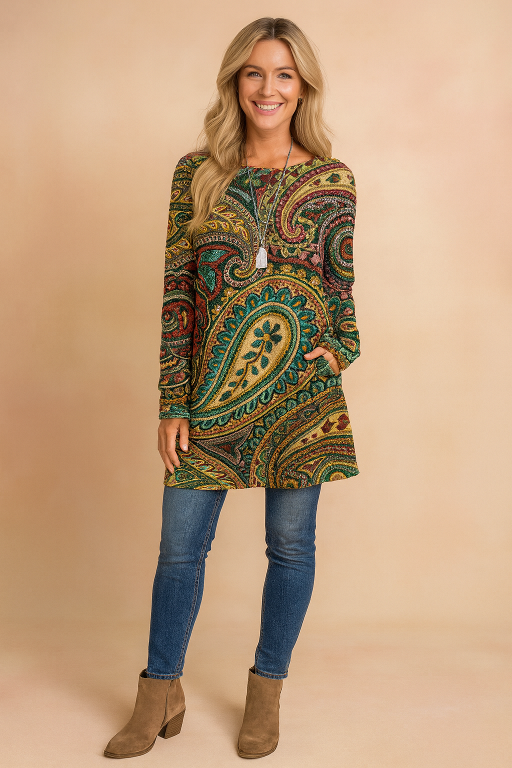 Women's elegant oversized paisley print sweater. Vibrant long-sleeve knitwear, perfect for casual chic fall outfits.