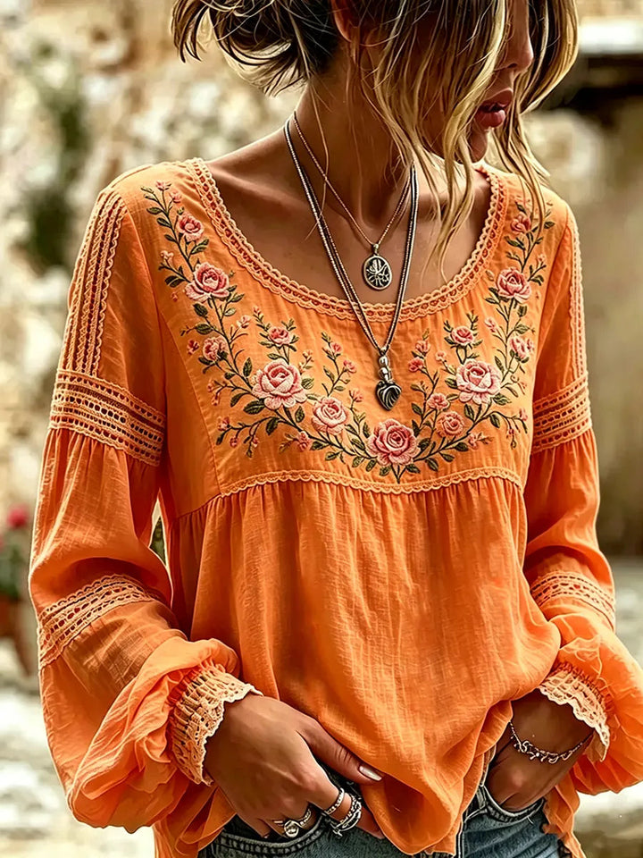 Comfortable women's floral blouse, elegantly embroidered with a relaxed long sleeve design for ladies.