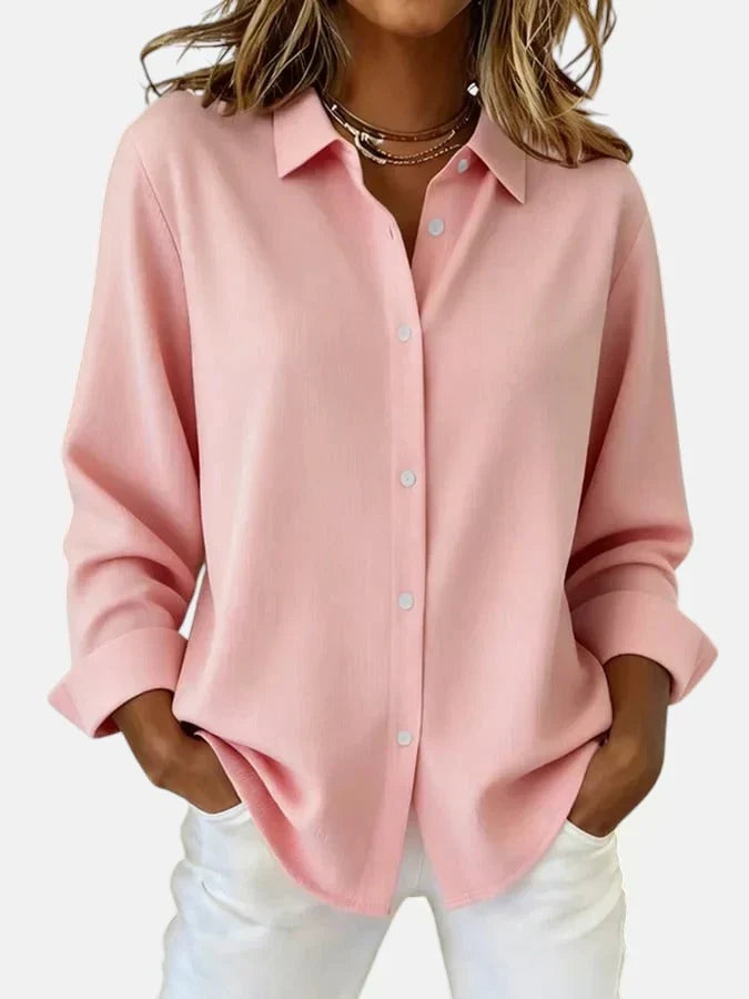 Comfortable women's flowy summer blouse in a vibrant color, ideal for casual chic & effortless fashion.