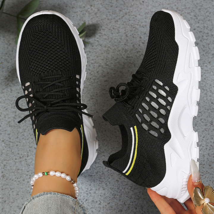 Stylish women's athletic sneakers, wide toe box, and supportive design for foot relief & comfort.