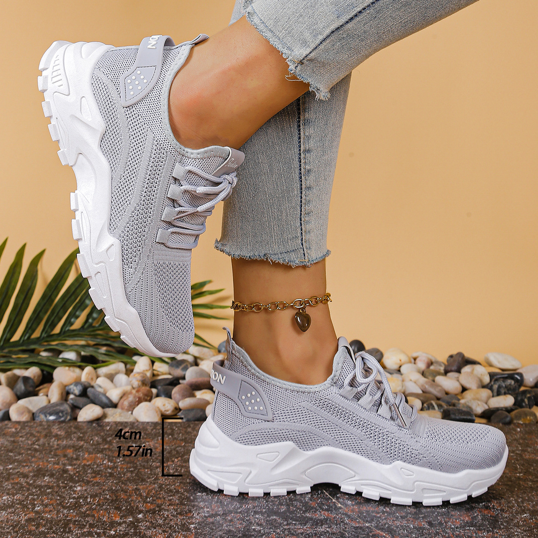 Stylish women's orthopedic sneakers, offering arch support & wide toe for all-day comfort.