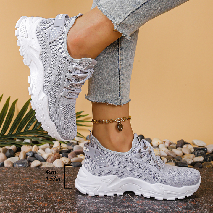 Stylish women's orthopedic sneakers, offering arch support & wide toe for all-day comfort.
