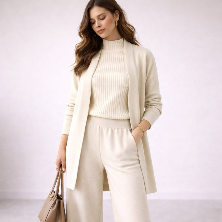Comfortable women's three-piece knit lounge set with cardigan, mock neck top & wide-leg pants. Ideal home & travel wear.