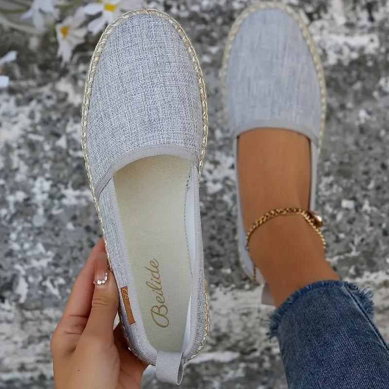 Flat espadrille shoes for women, featuring a lightweight design for ultimate summer comfort.