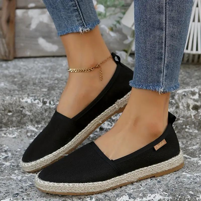 Easy-wear women's espadrille flats; lightweight, comfortable slip-on shoes for summer casual style.