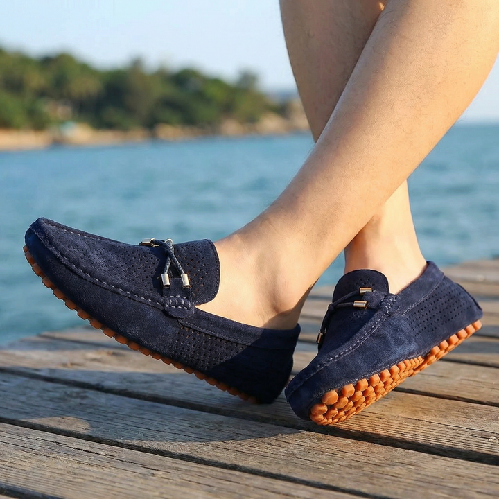 Classic men's brown perforated loafers, comfortable and breathable casual slip-on shoes for summer.