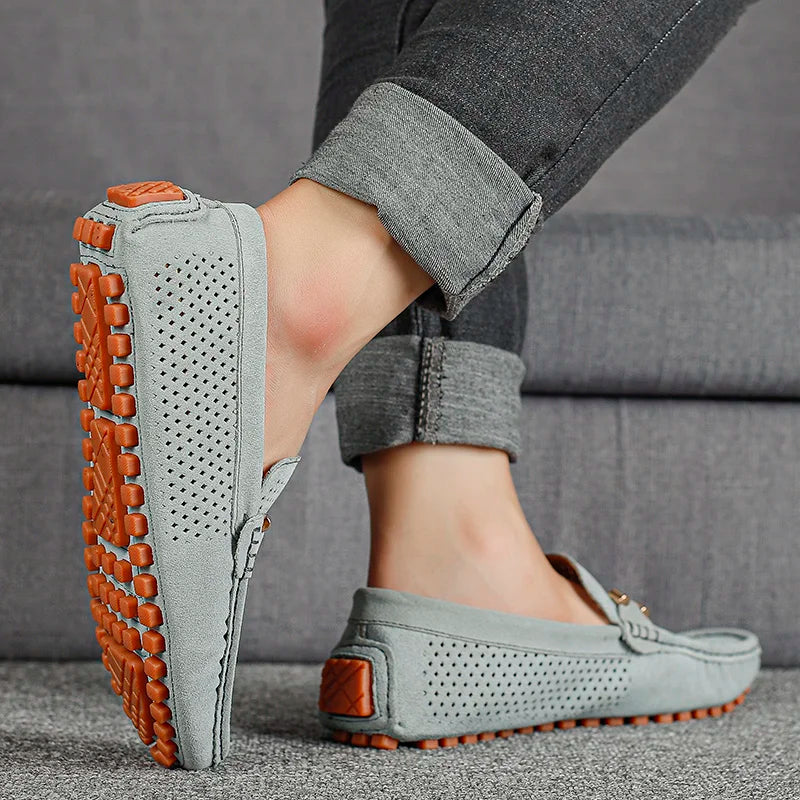 Grey men's breathable loafers, perforated design for ultimate comfort, ideal slip-on casual summer shoes.