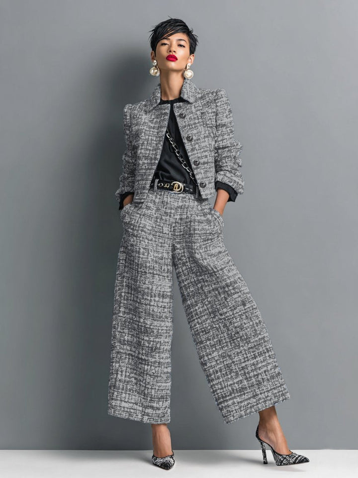 Elegant women's tweed two-piece set with a cropped jacket and wide-leg pants, perfect for sophisticated office wear.