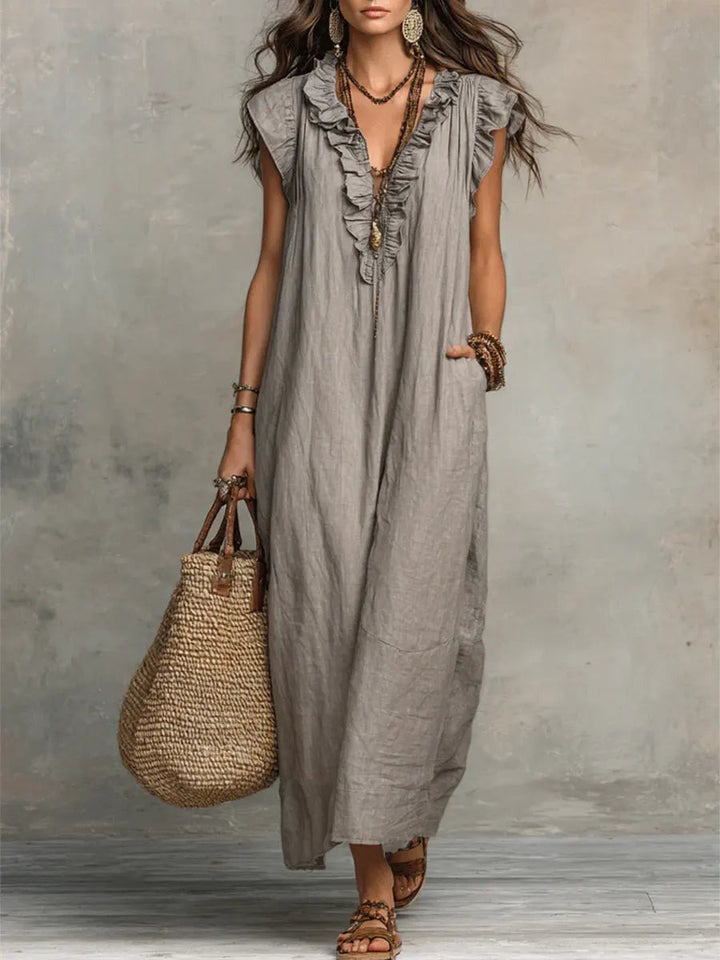 Elegant women's ruffle V-neck maxi dress with a flowing silhouette, perfect for summer events.