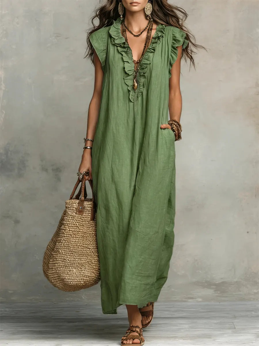 Stylish women's sleeveless maxi dress, featuring a flattering V-neck and delicate ruffles.