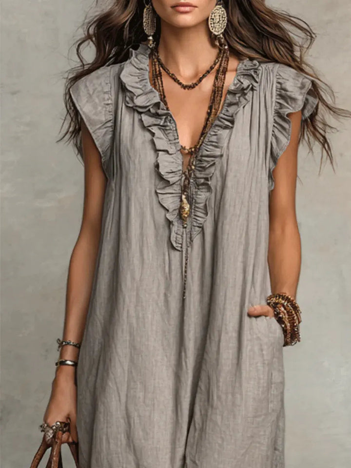 Lightweight women's summer maxi dress with a flattering V-neck, elegant ruffles, and flowing skirt.