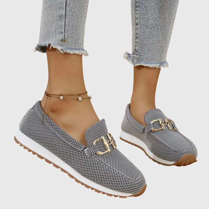 Stylish gray women's orthopedic loafers, perfect casual slip-on shoes for comfortable all-day wear.