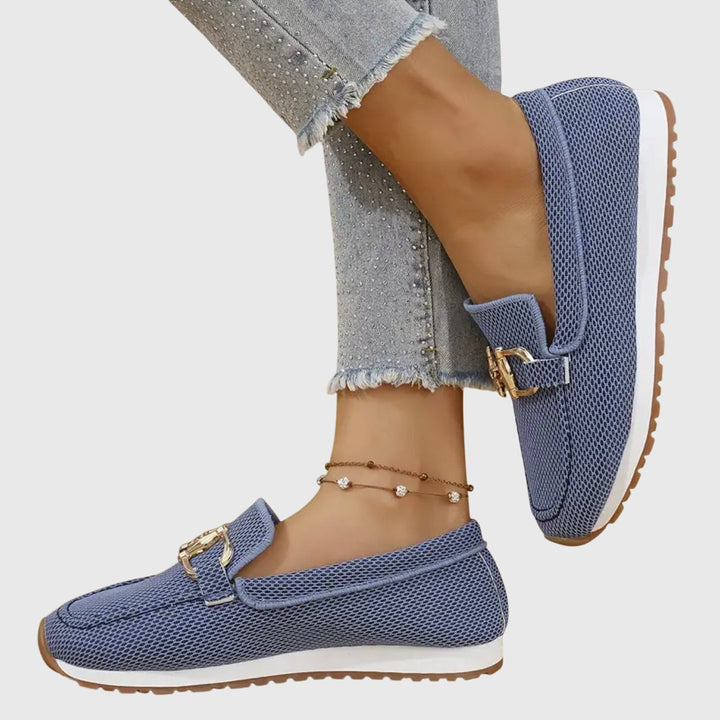 Gray slip-on orthopedic loafers for women, offering comfortable footwear and stylish arch support.
