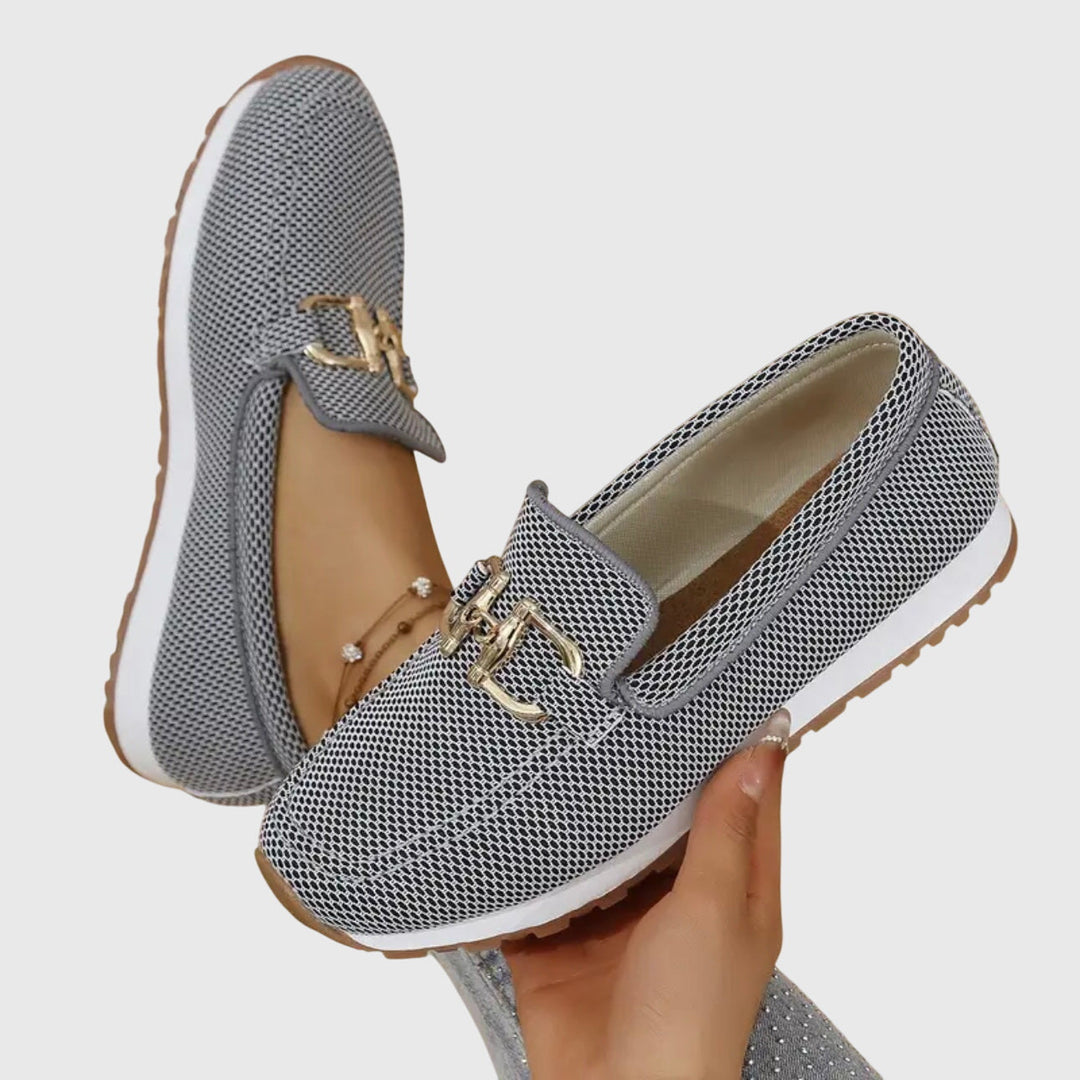 White casual women's orthopedic loafers, perfect slip-on shoes for comfortable and supportive walking.