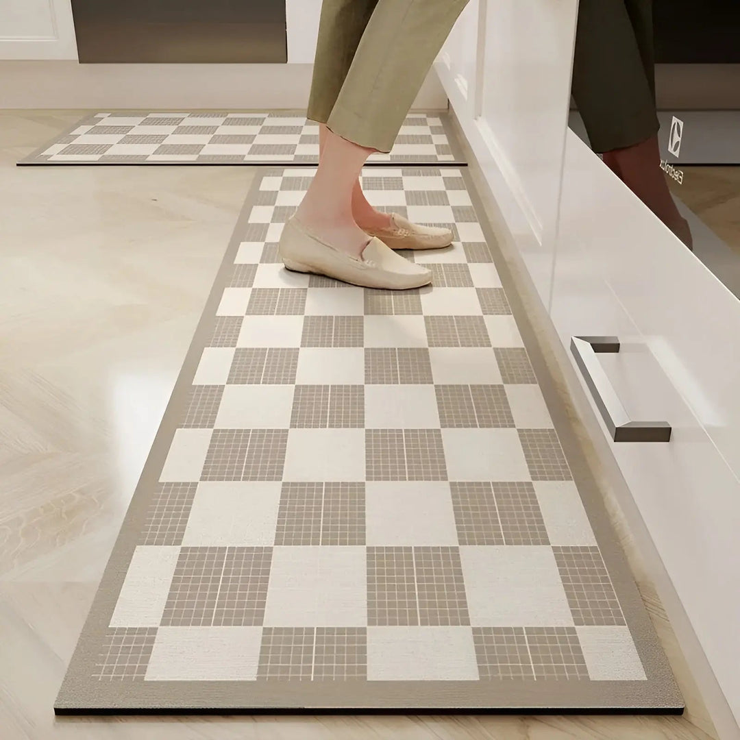Ultra-absorbent kitchen mat, fast-drying design with non-slip backing. Perfect comfort floor mat.