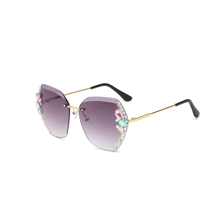 Women's rimless rhinestone sunglasses with a gold frame, glamorous chic eyewear.