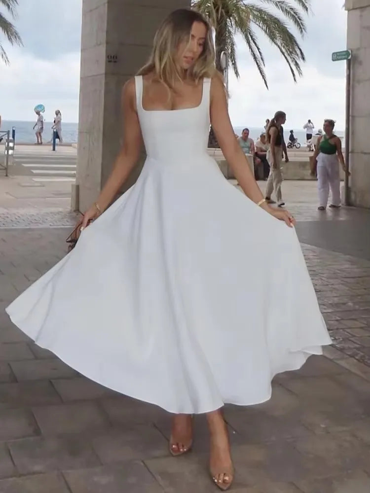 Elegant women's embellished midi cocktail dress, perfect for special occasions, parties, and formal events.