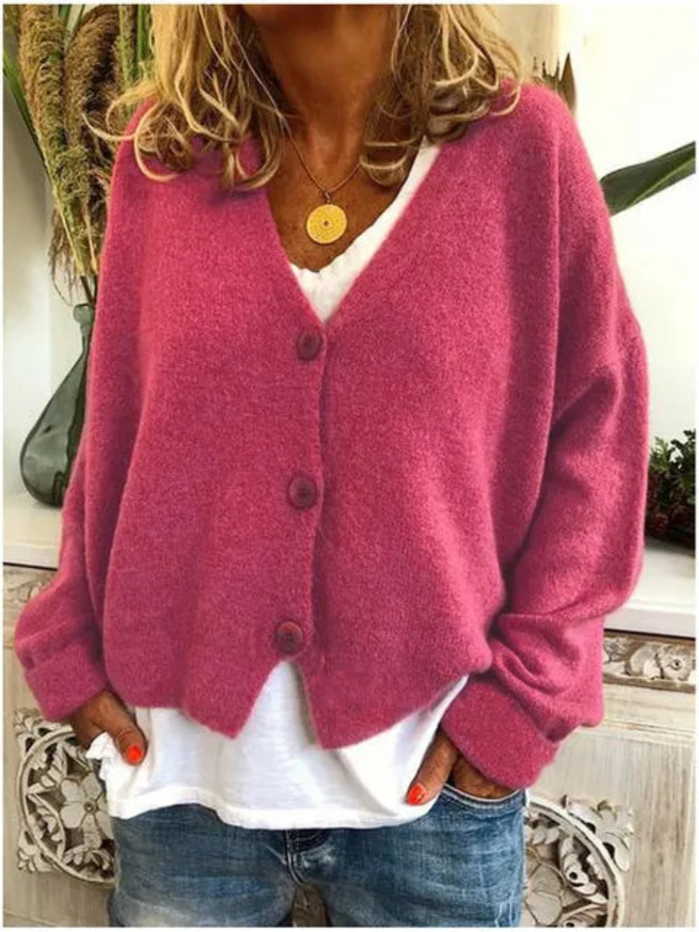 Women's V-neck knit cardigan with button-front closure, ideal for layered fashion & casual wear. Long sleeve top.