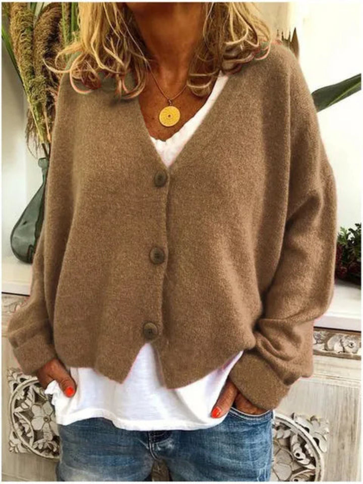 Elegant women's V-neck button-front knit cardigan, perfect for spring or autumn layered styles & relaxed fit fashion.