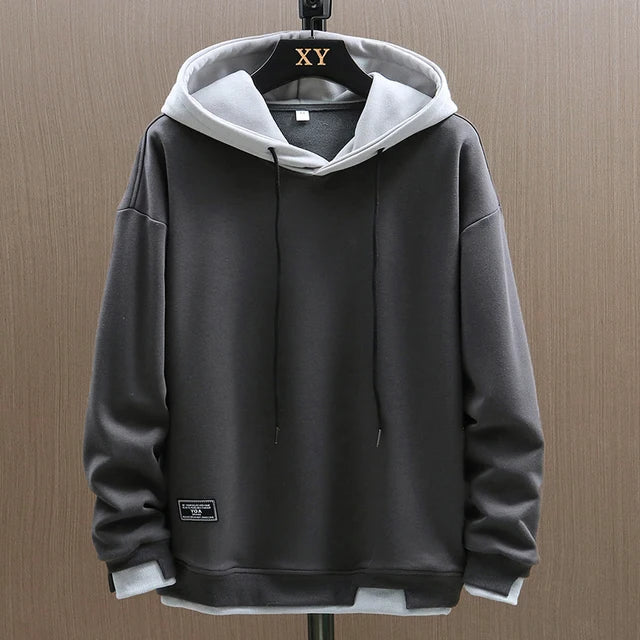 Simple and comfortable men's hooded pullover for everyday wear. Features kangaroo pocket & adjustable drawstrings.