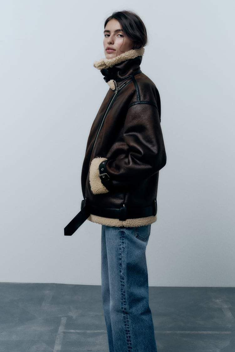 Elegant women's faux lapel jacket. Classic fit versatile outerwear for seasonal layering & a stylish look.