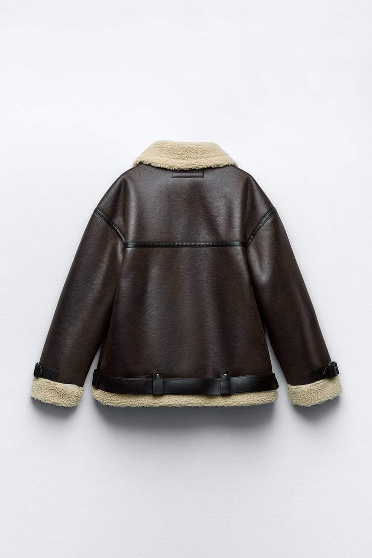 Modern women's faux lapel jacket. Versatile and elegant outerwear, ideal for a classic fit and layering.