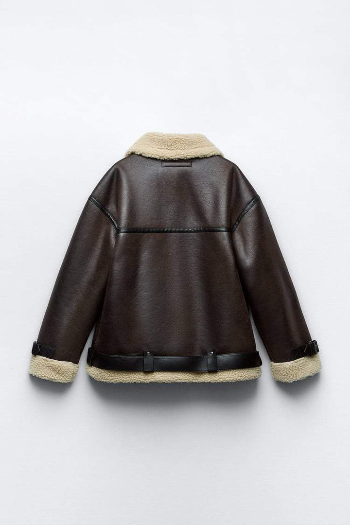 Modern women's faux lapel jacket. Versatile and elegant outerwear, ideal for a classic fit and layering.