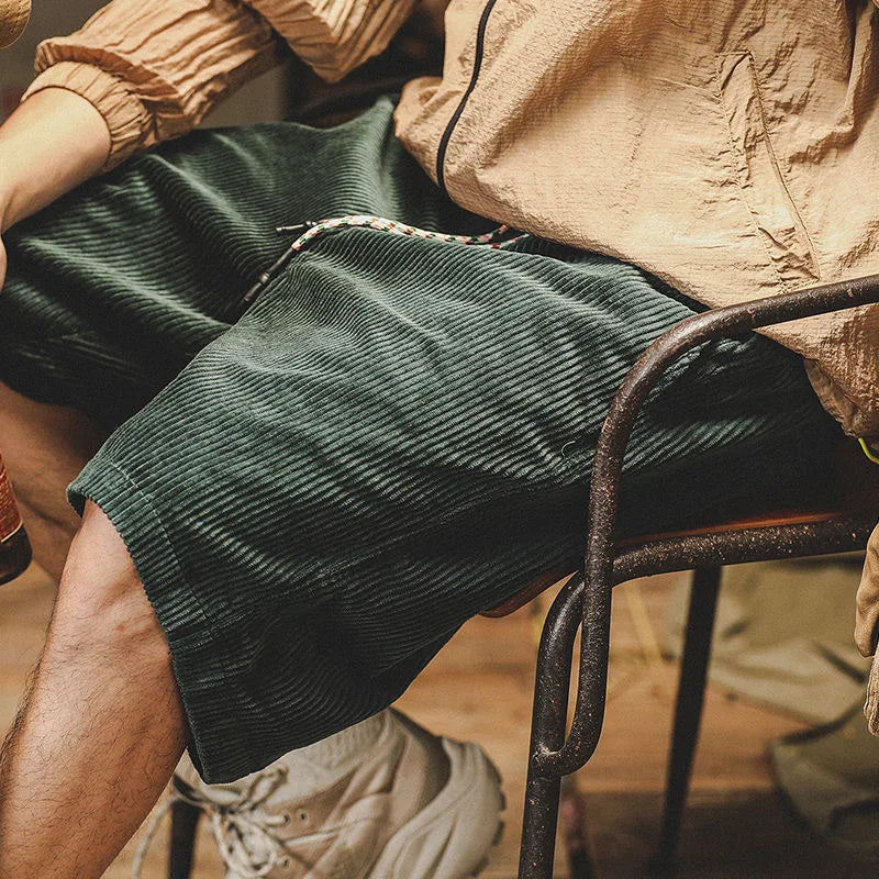 Khaki men's vintage style summer shorts with a relaxed fit, great for casual outings and beachwear.