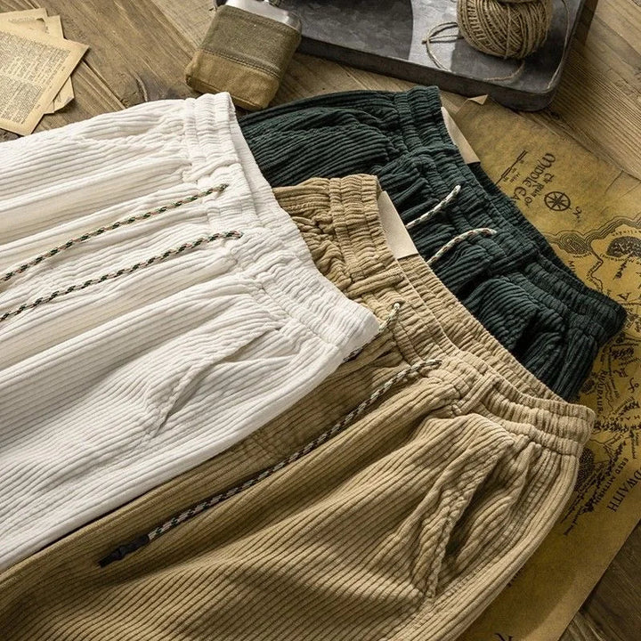 Beige vintage style men's summer shorts, offering a comfortable and relaxed fit for any casual occasion.