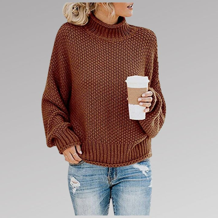 Modern fit women's knitted sweater, an everyday essential long-sleeve top for versatile styling.