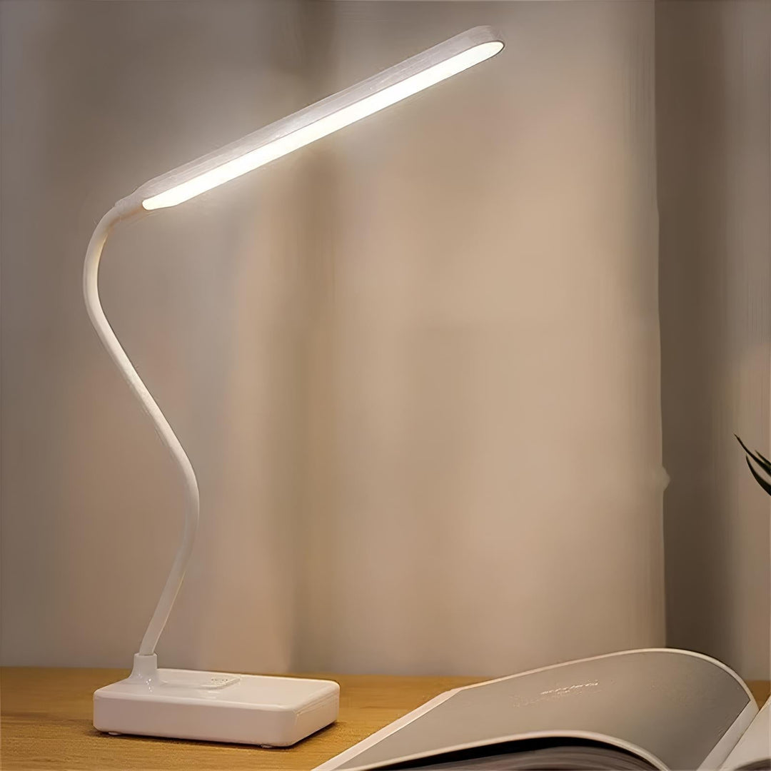 Adjustable LED desk lamp offering dimmable light and a flexible arm for comfortable reading.