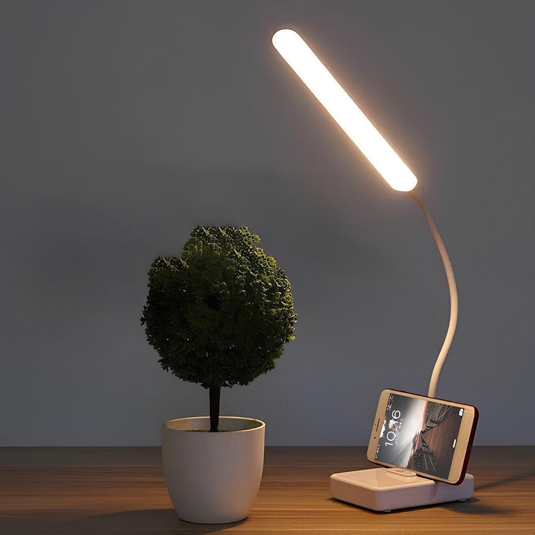 Flexible LED desk lamp with an adjustable gooseneck arm, perfect for precise task lighting.