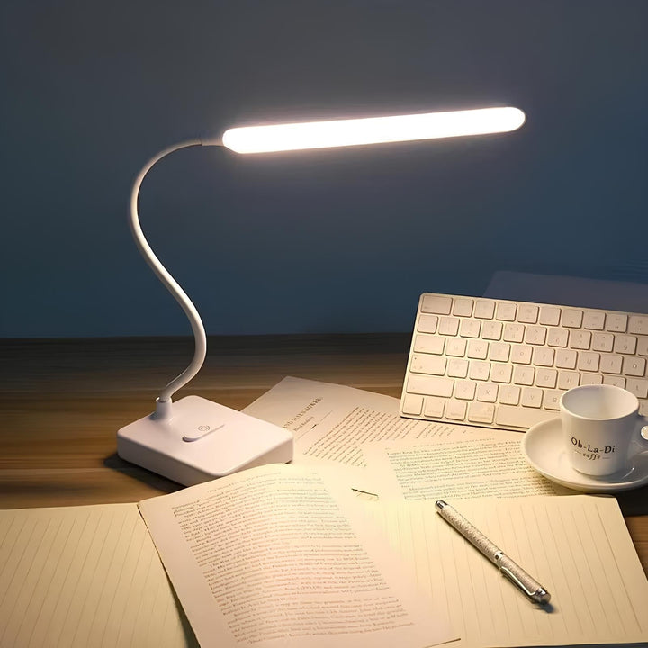 Modern flexible LED desk lamp with dimmable light settings & an adjustable arm for optimal lighting.