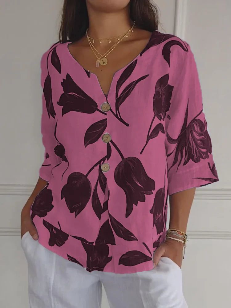Chic women's long sleeve floral print blouse. Versatile button-up top for everyday wear or elegant occasions.