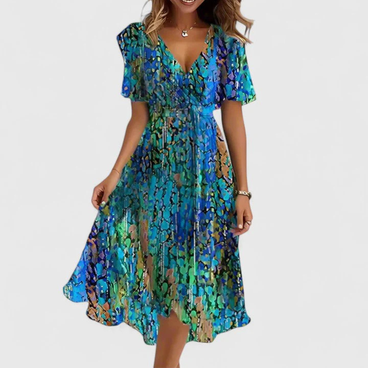 Flowy floral midi dress for women, featuring a flattering V-neck and delicate flutter sleeves.