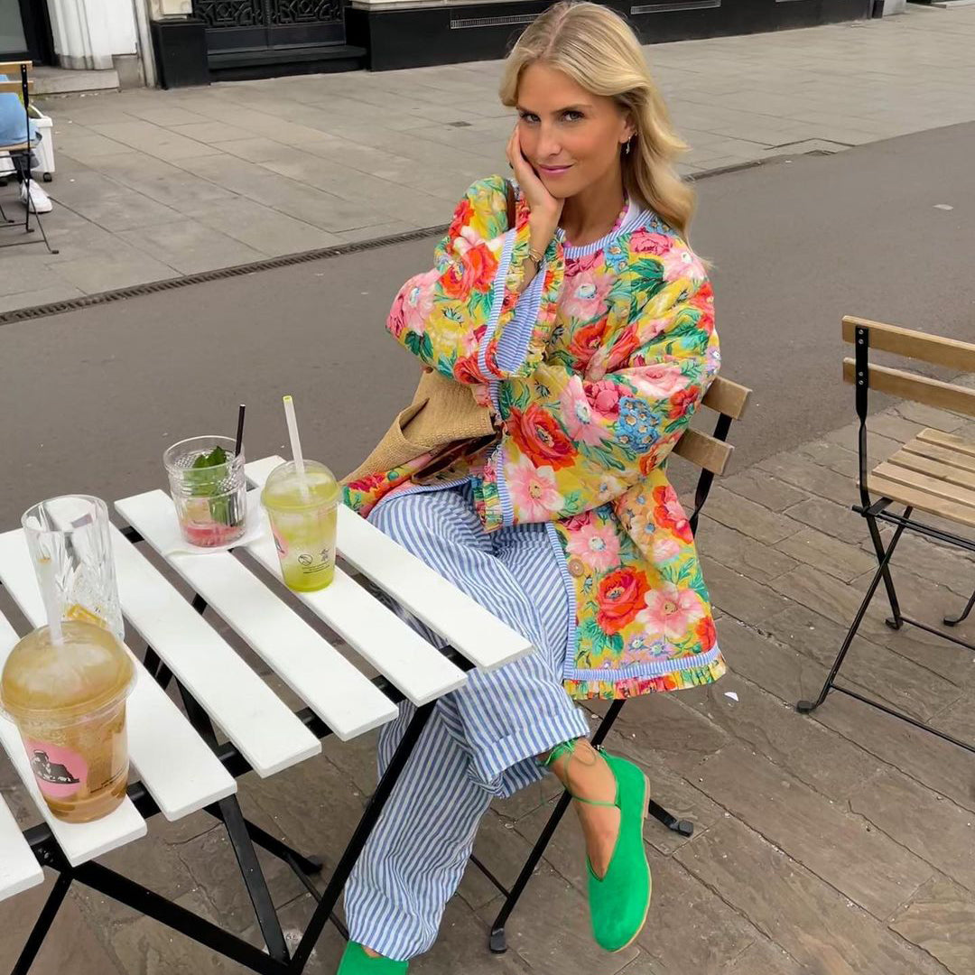 Statement women's quilted floral jacket, vintage-inspired design & oversized fit for fashionable winter outerwear.