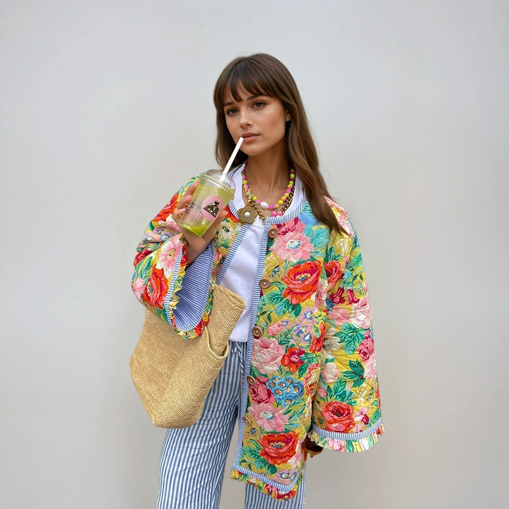 Women's vintage-inspired quilted floral jacket with an oversized fit, perfect for chic winter fashion & outerwear.