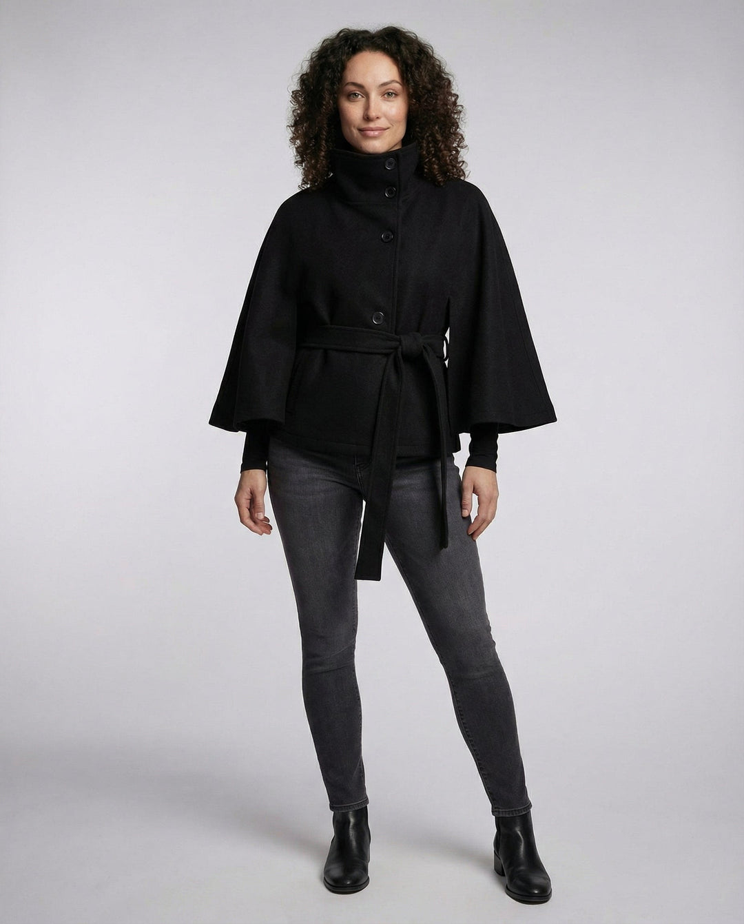 Stylish long wrap jacket for women, featuring a high collar & adjustable belt, ideal for elegant fashion.