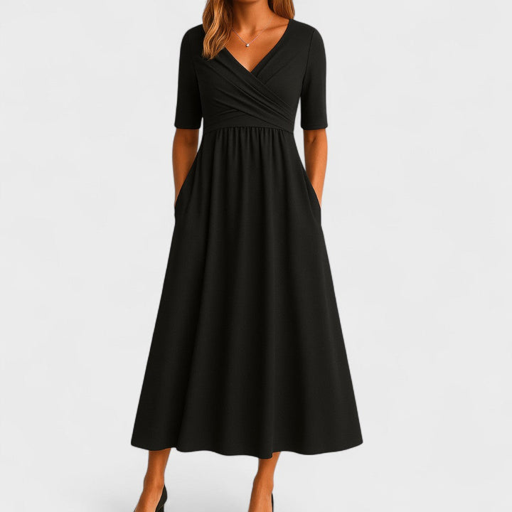Chic women's V-neck midi dress, versatile for casual, party, or occasion wear. Elegant and flattering short sleeve design.