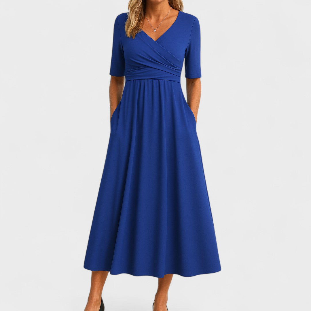 Flattering V-neck midi dress for women, ideal for summer elegance or casual comfort. Chic short sleeve design.