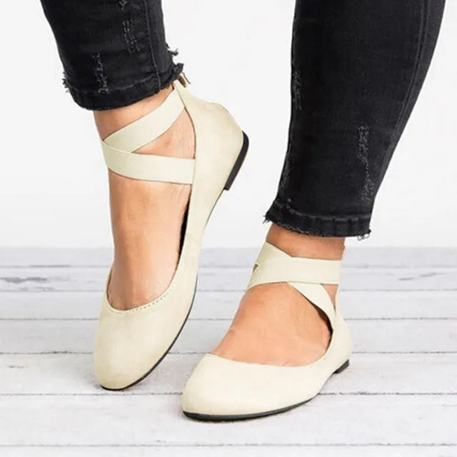 Women's cross-strap ballet flats for elegant, comfortable everyday wear. Versatile slip-on style.