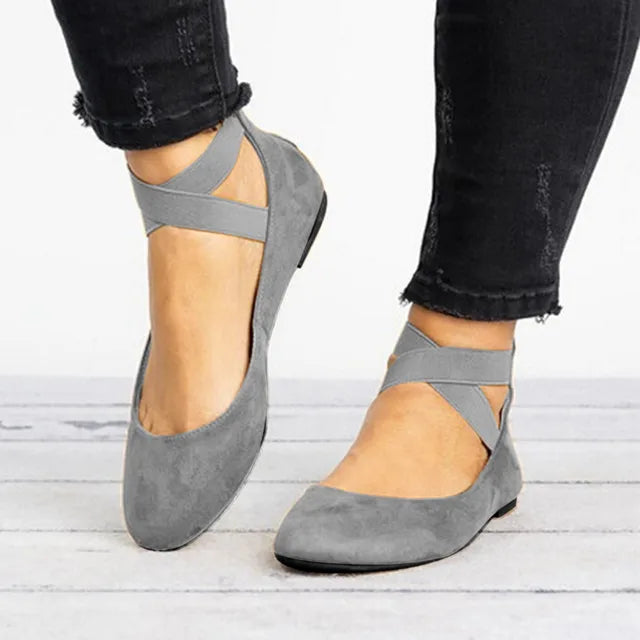 Classic women's cross-strap ballet flats. Elegant and versatile for all-day comfort and style.