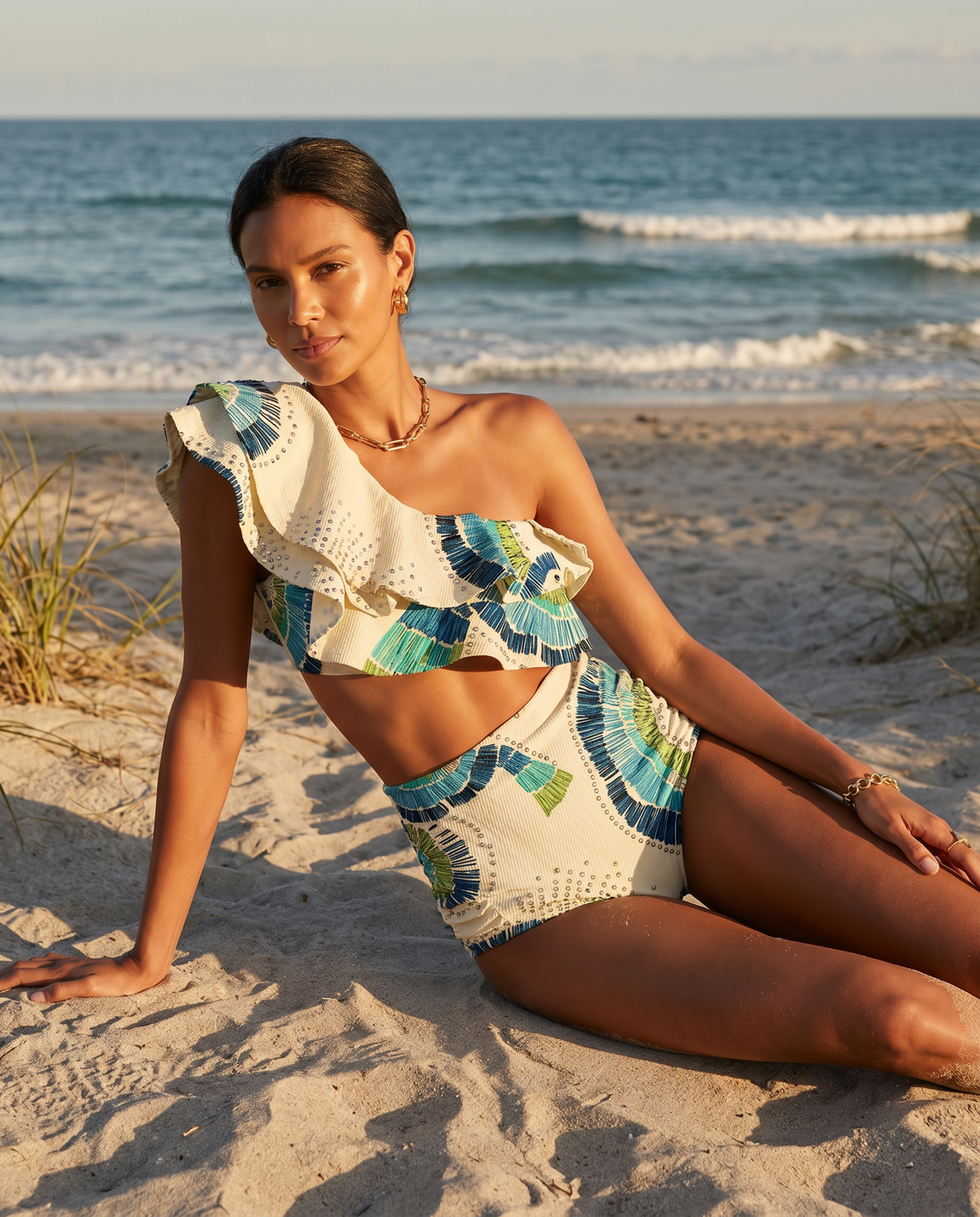 White one-shoulder high-waist bikini set for women with elegant embellishments, ideal resort & beachwear.