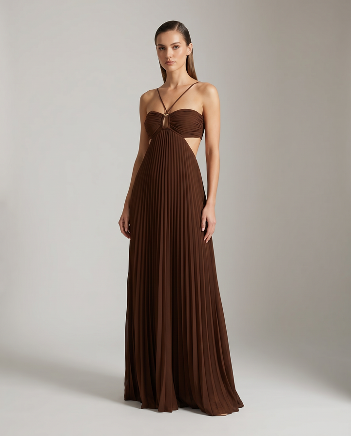 Flowy pleated women's maxi dress with a sophisticated halter neckline, great for chic summer events.