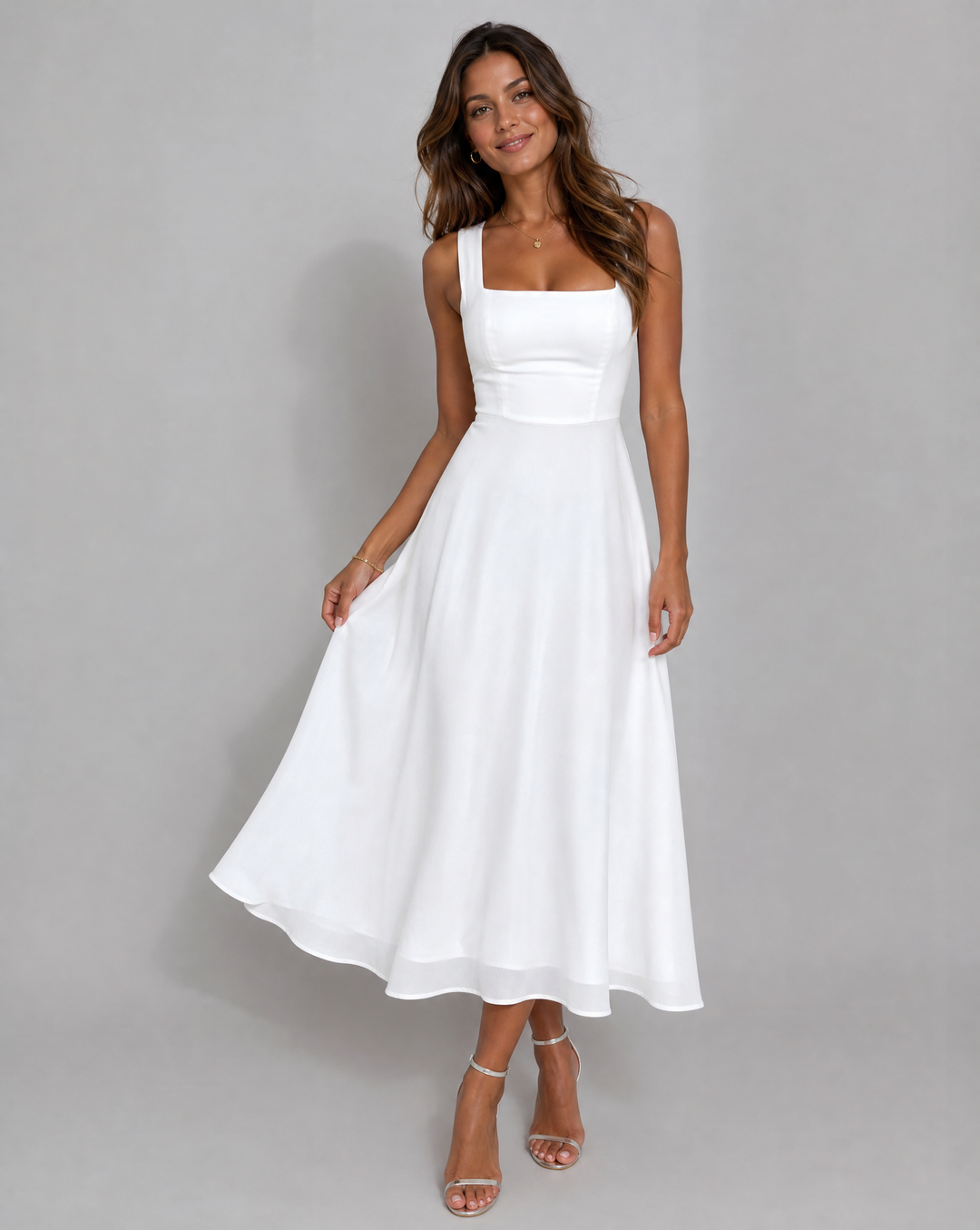 Chic women's A-line midi dress, ideal as a wedding guest dress or elegant party attire. Classic summer fashion.